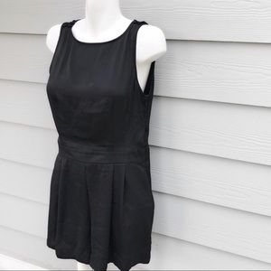 Black silk romper with pockets